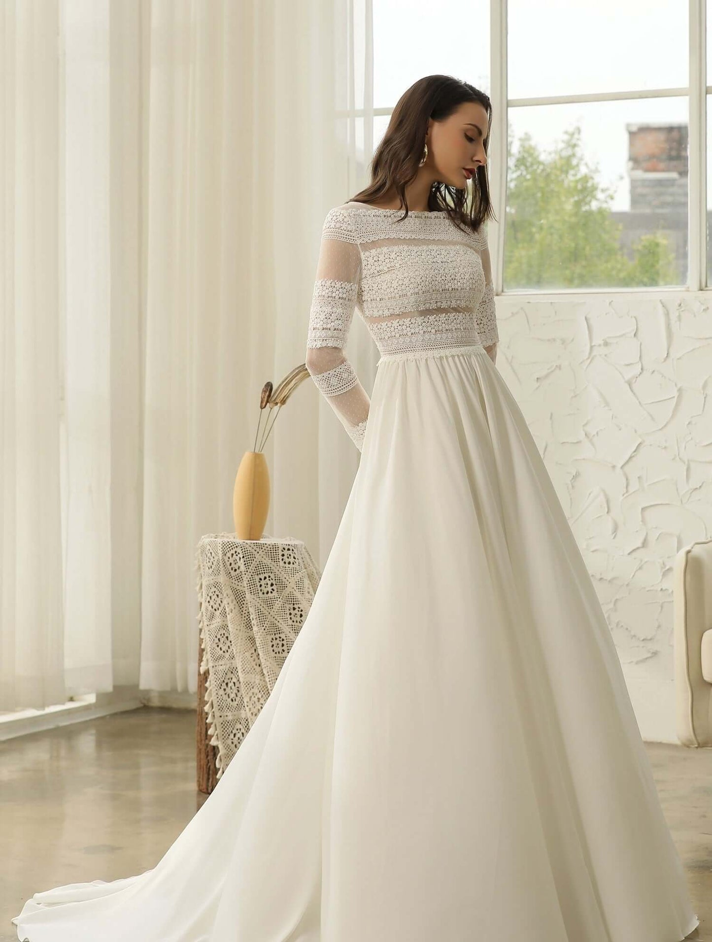 braut im langärmligen boho brautkleid